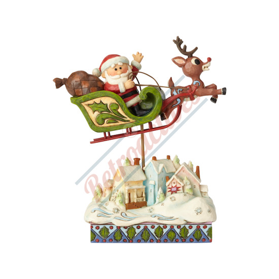 Rudolph Pulling Sleigh With Santa Over Village By Jim Shore